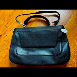 RODO black leather shoulder bag. Wore once. Pristine. Silver tone hardware.